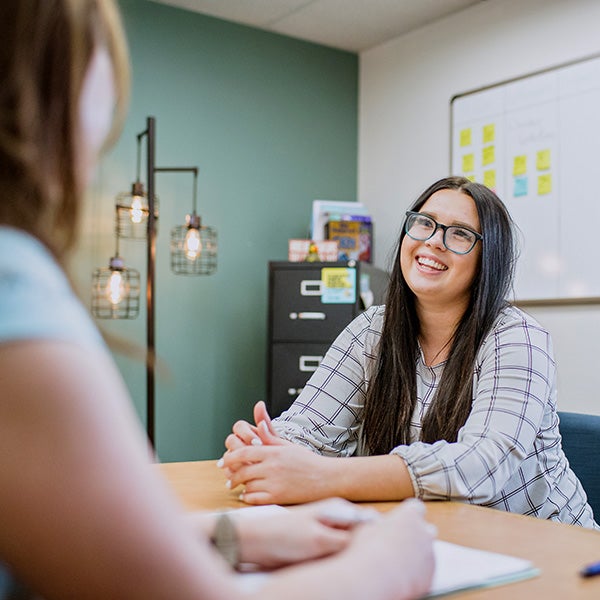 women in counseling office