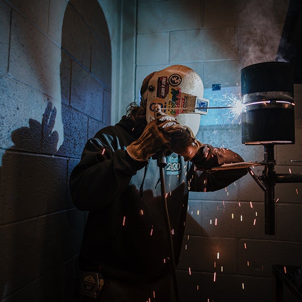 person welding 