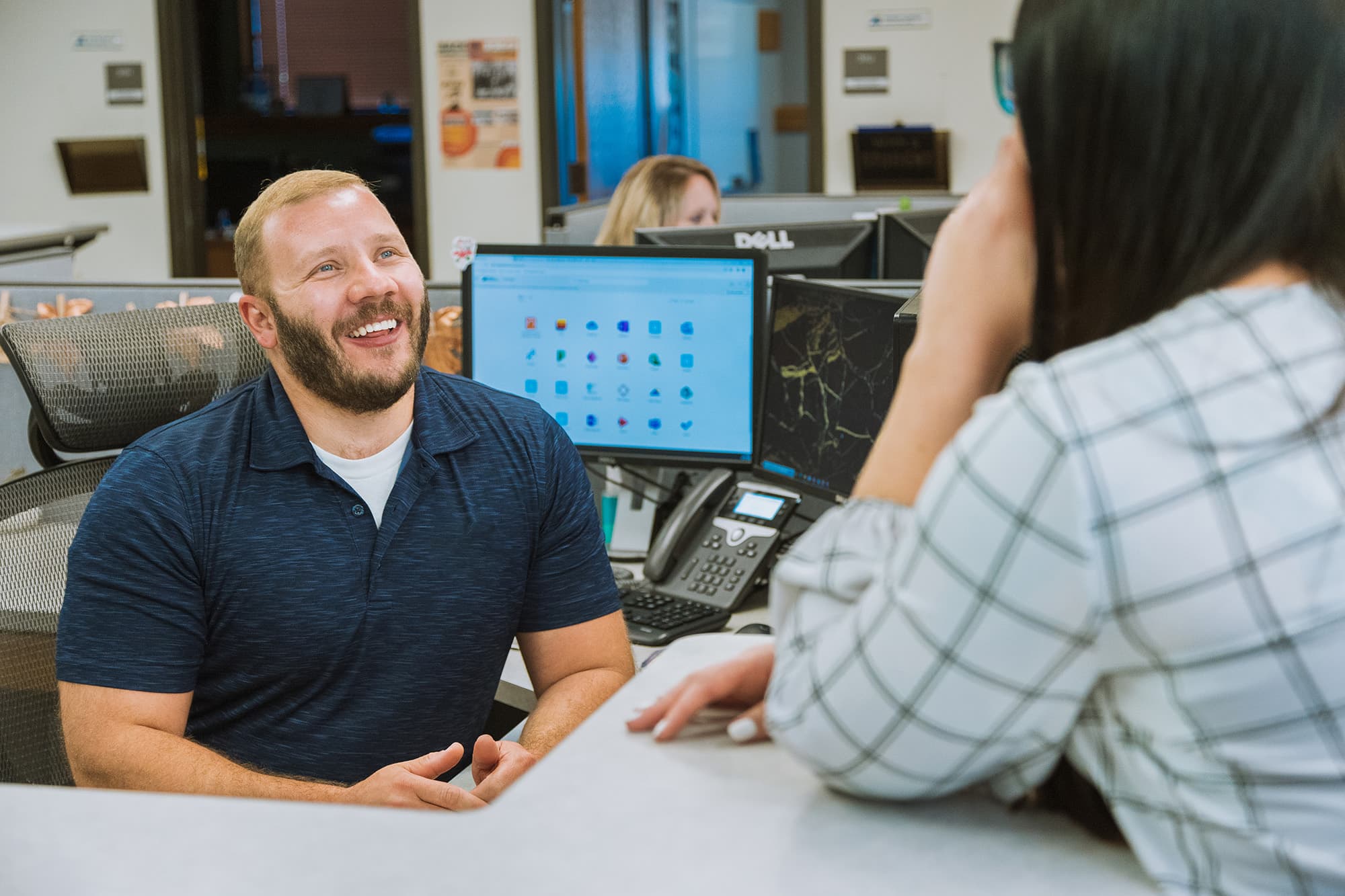 photo of CEI advisor speaking to student