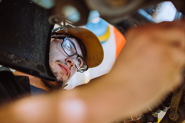 Man working in car