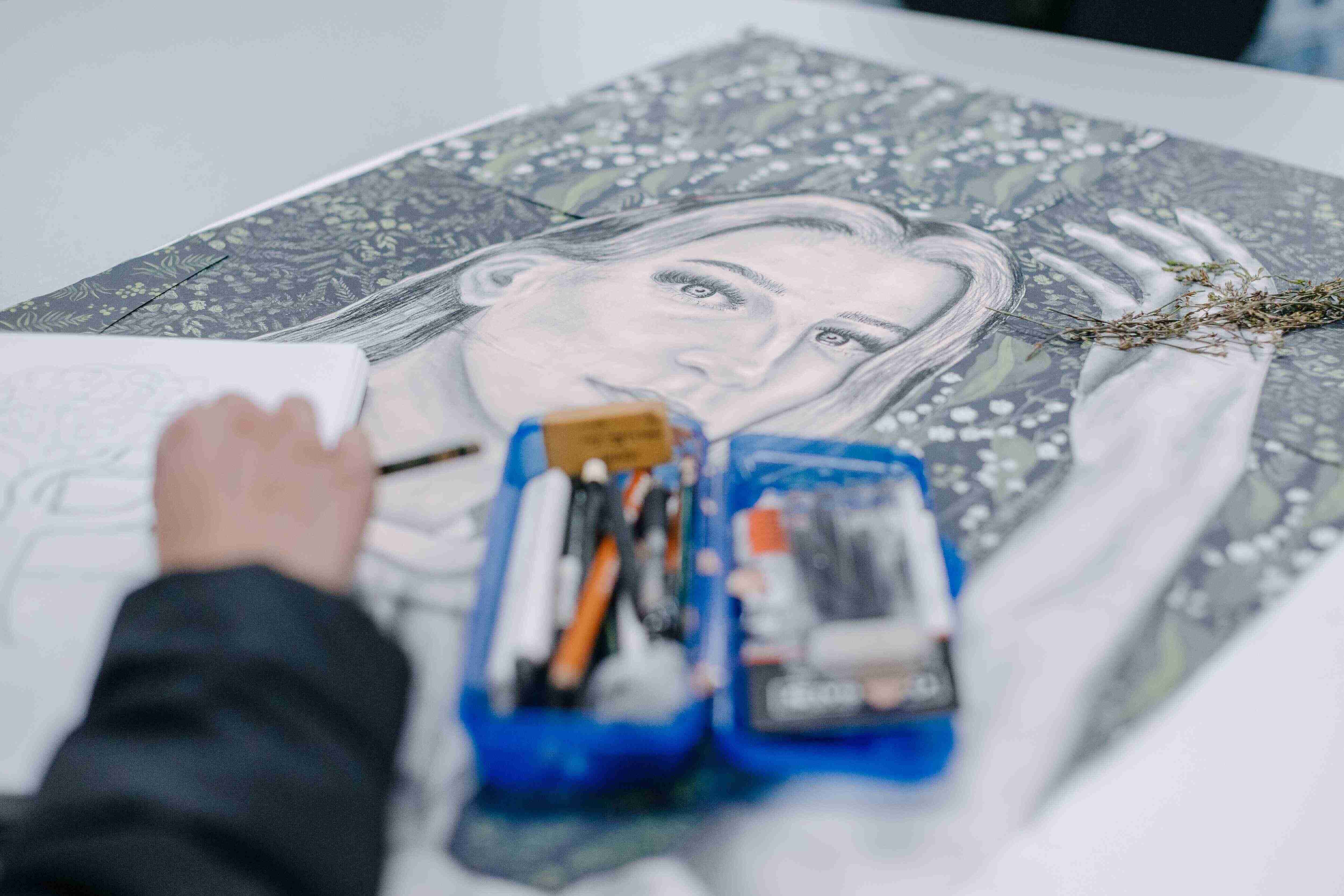 Woman working on a drawing