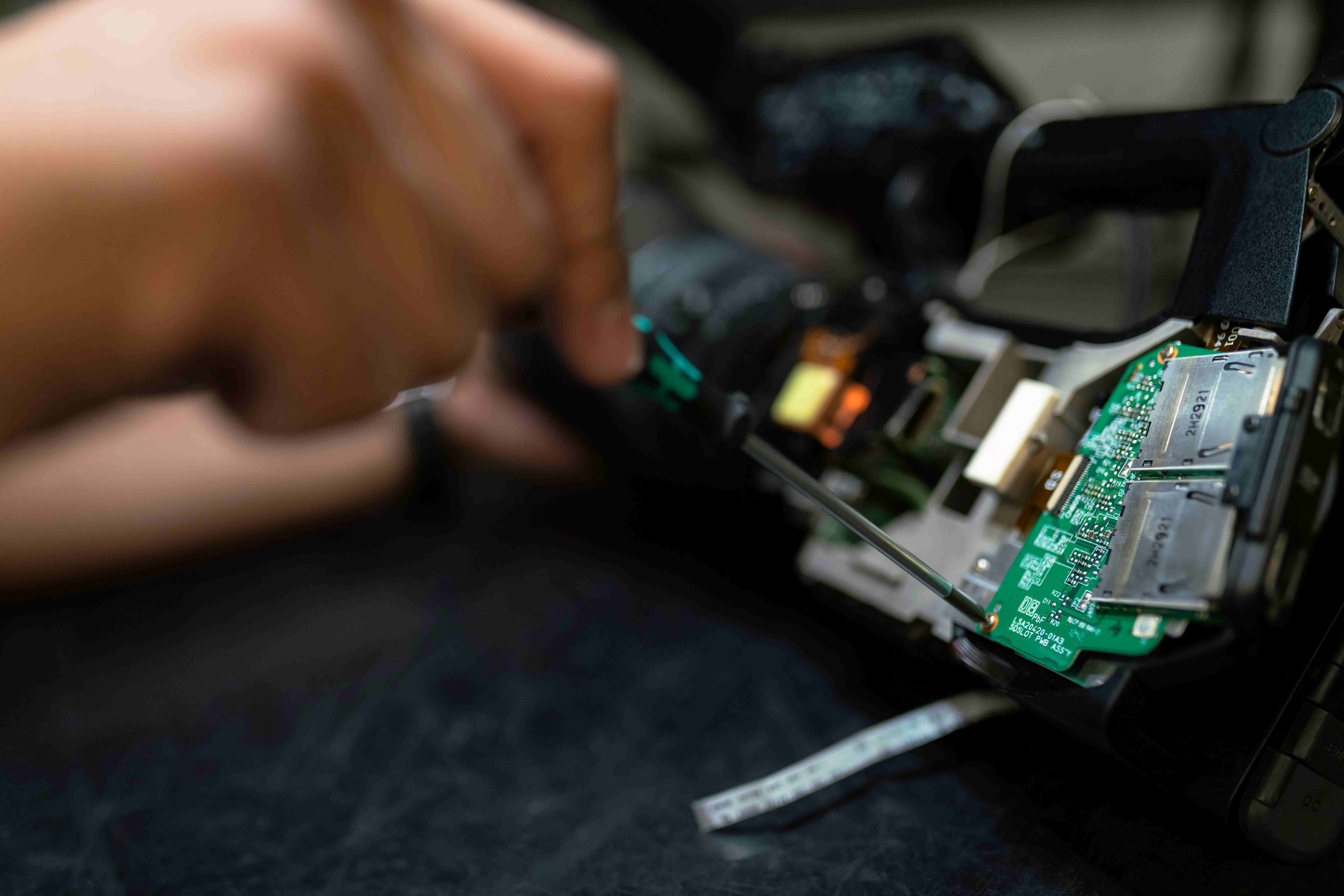 Person working on electronics