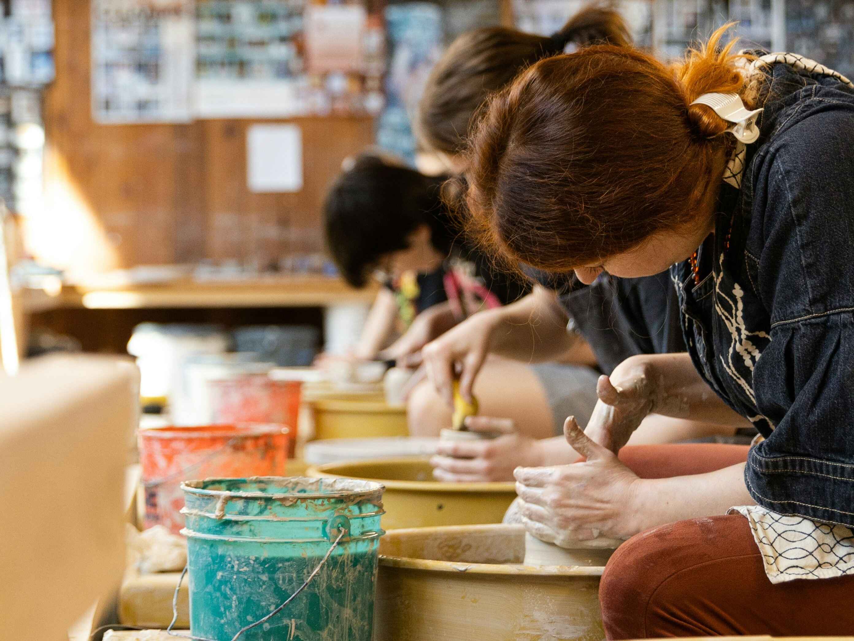 Students doing pottery