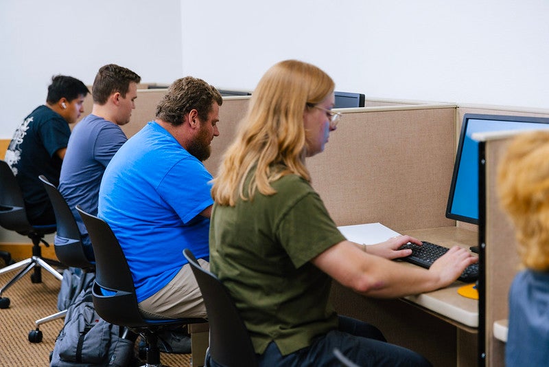 CEI Students in the library