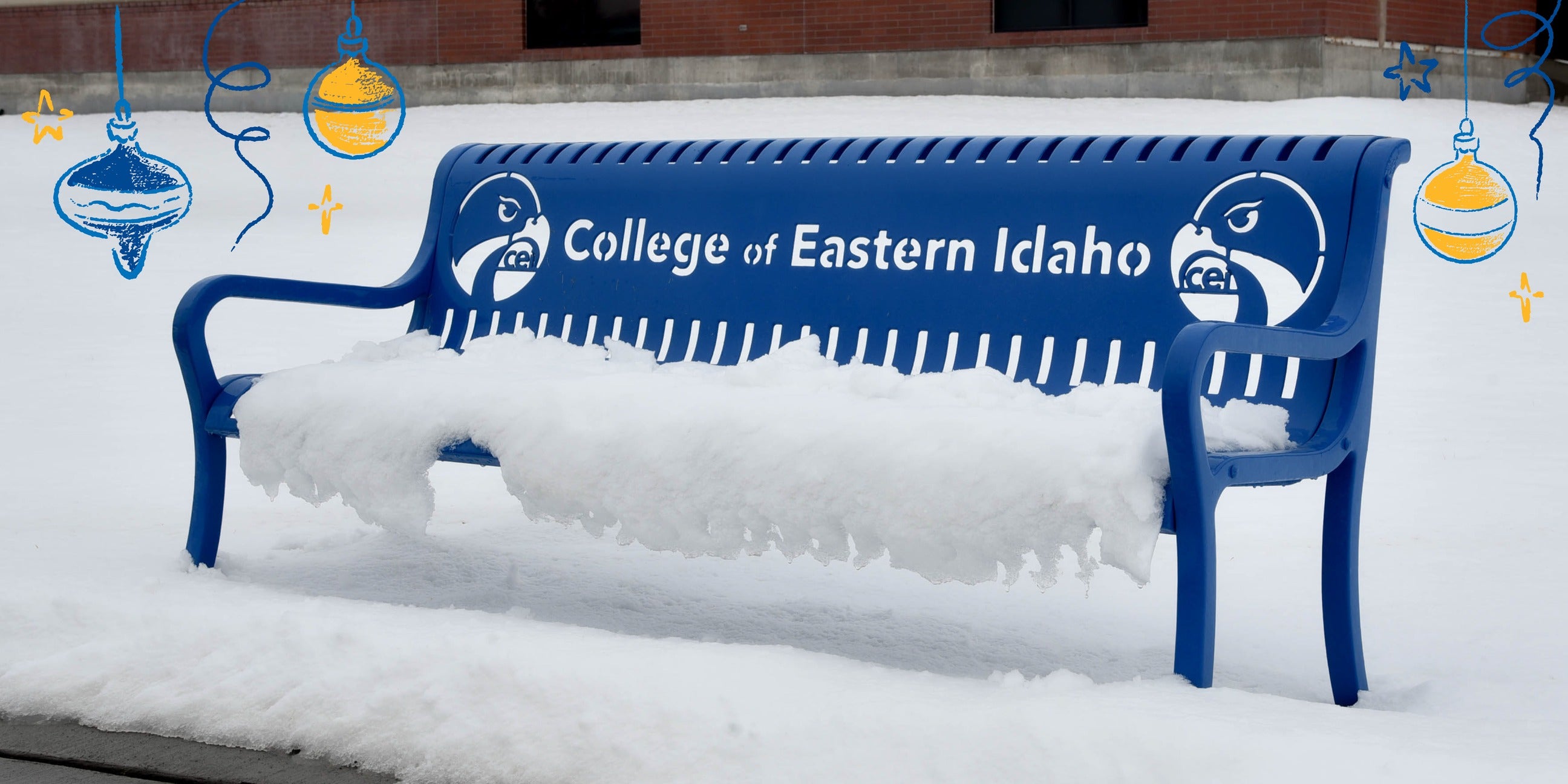 Holiday Web Banner depicting CEI bench covered in snow