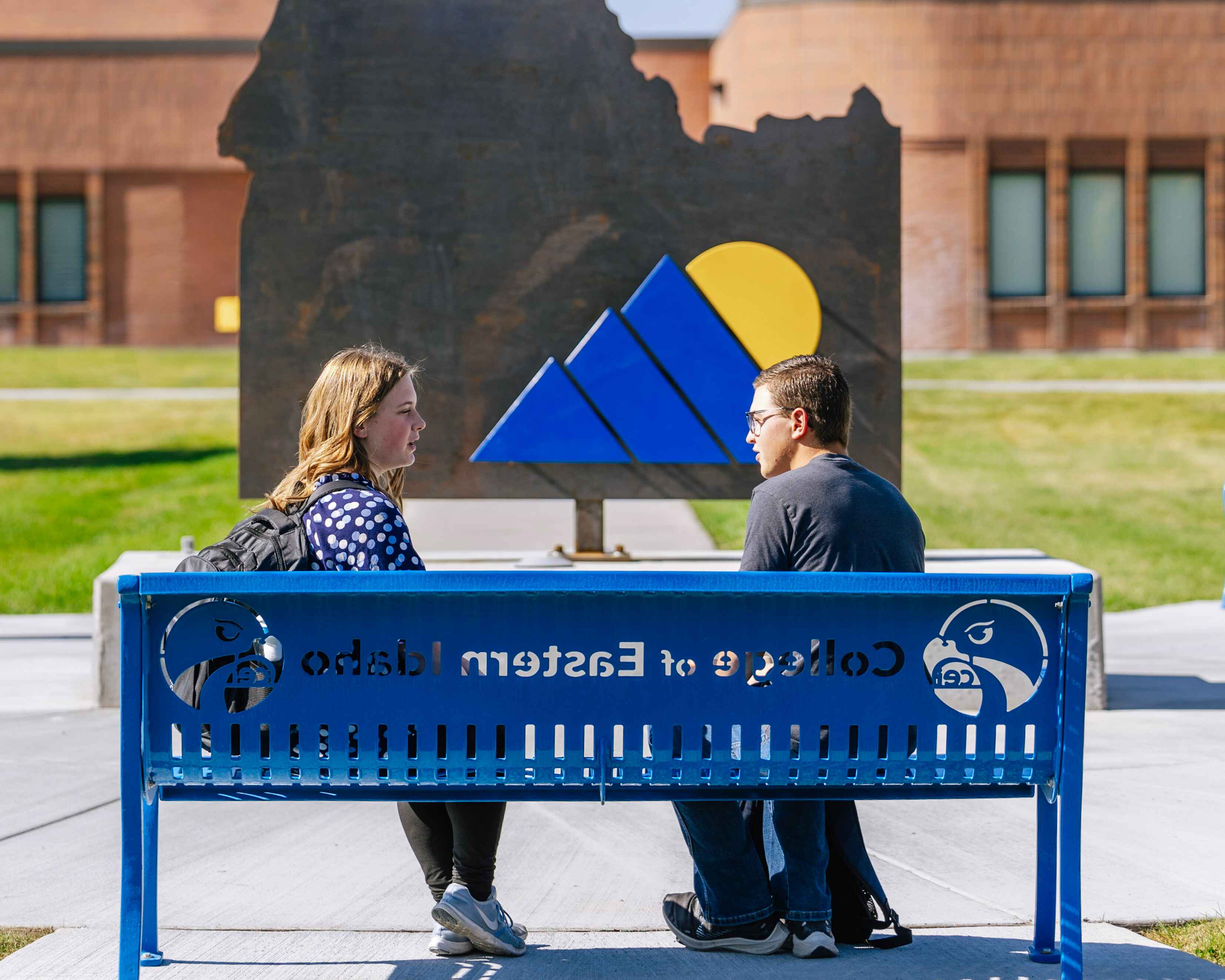 Students in front of College of Eastern Idaho sign