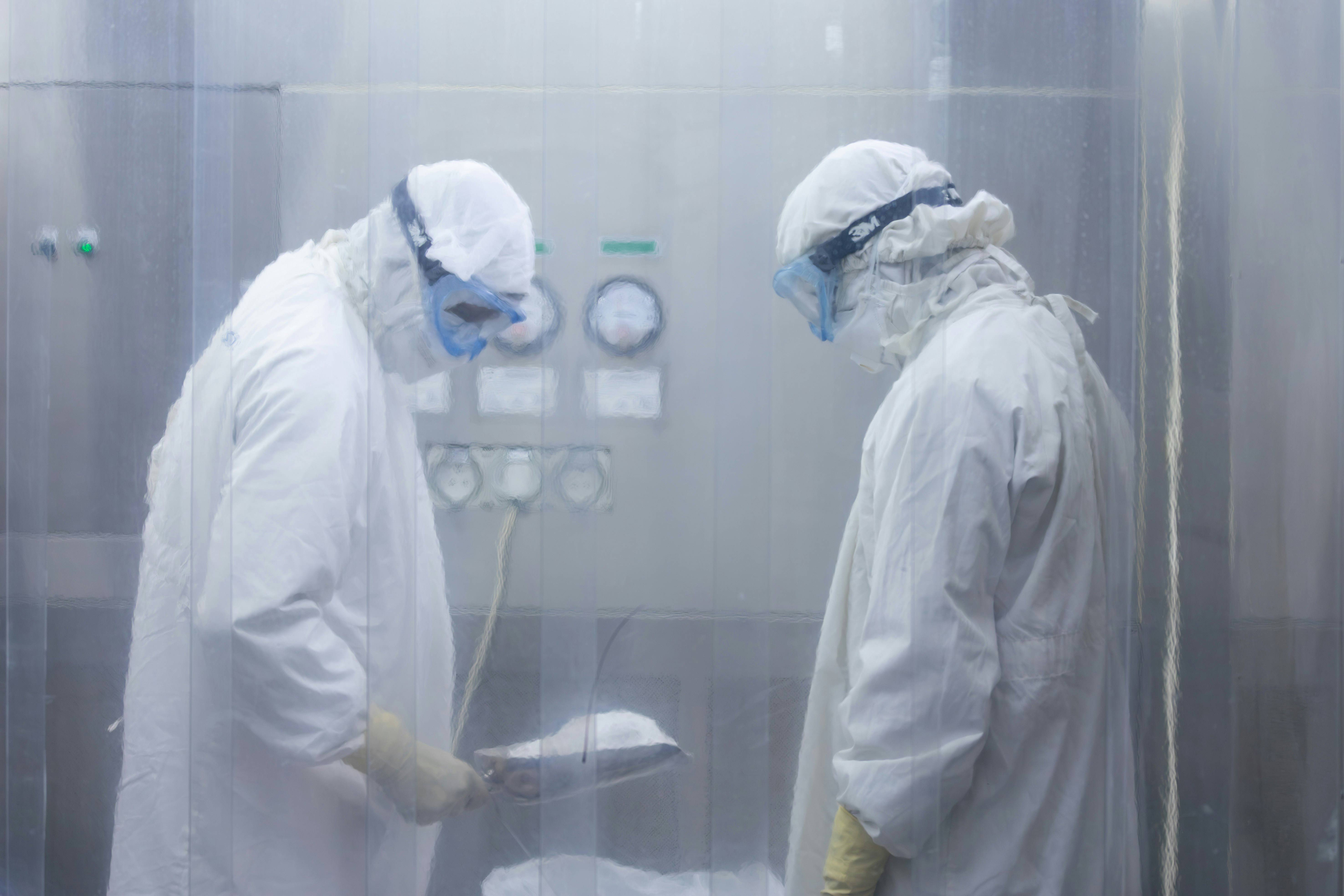 Technicians in safety gear