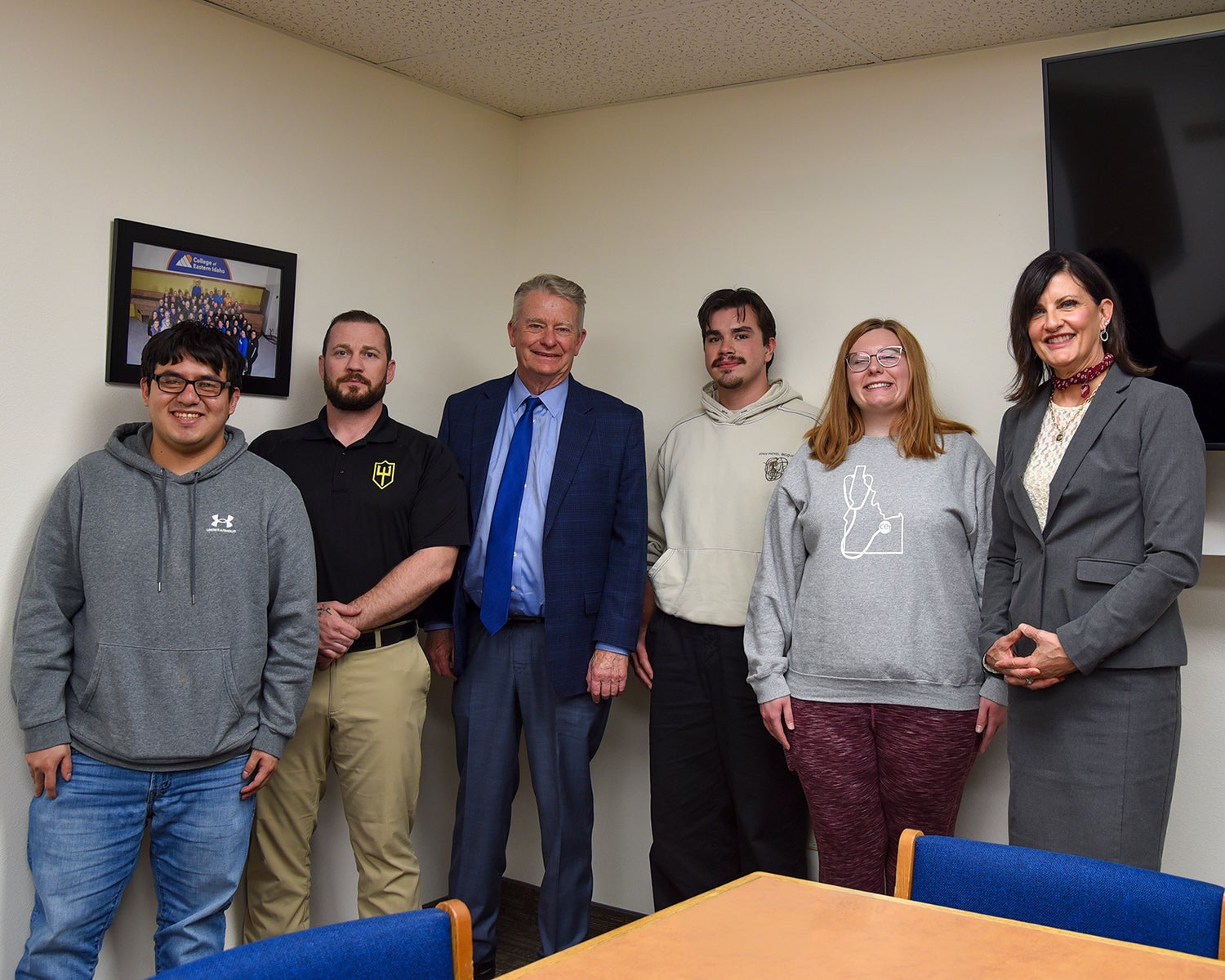 Governor Brad Little engages with College of Eastern Idaho students, discussing their academic experiences and career goals during his campus visit.