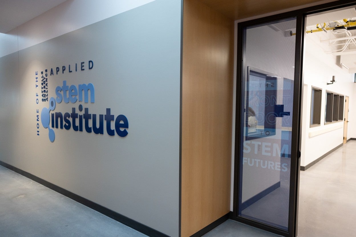 Entrance and name placard for the STEM Institute at CEI