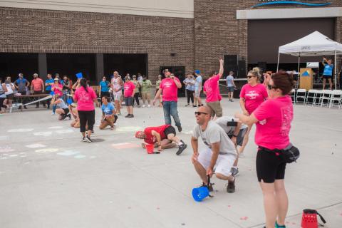 Runners warming up at the starting line of a race