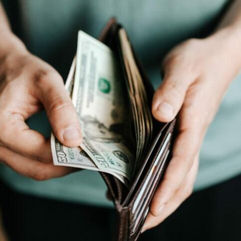 Pulling money out of a wallet