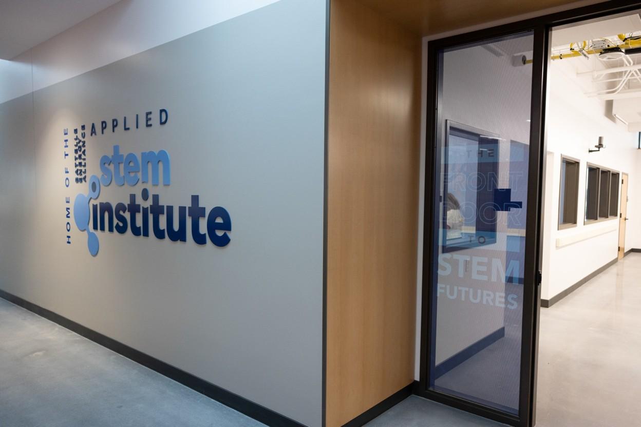 Entrance and name placard for the STEM Institute at CEI