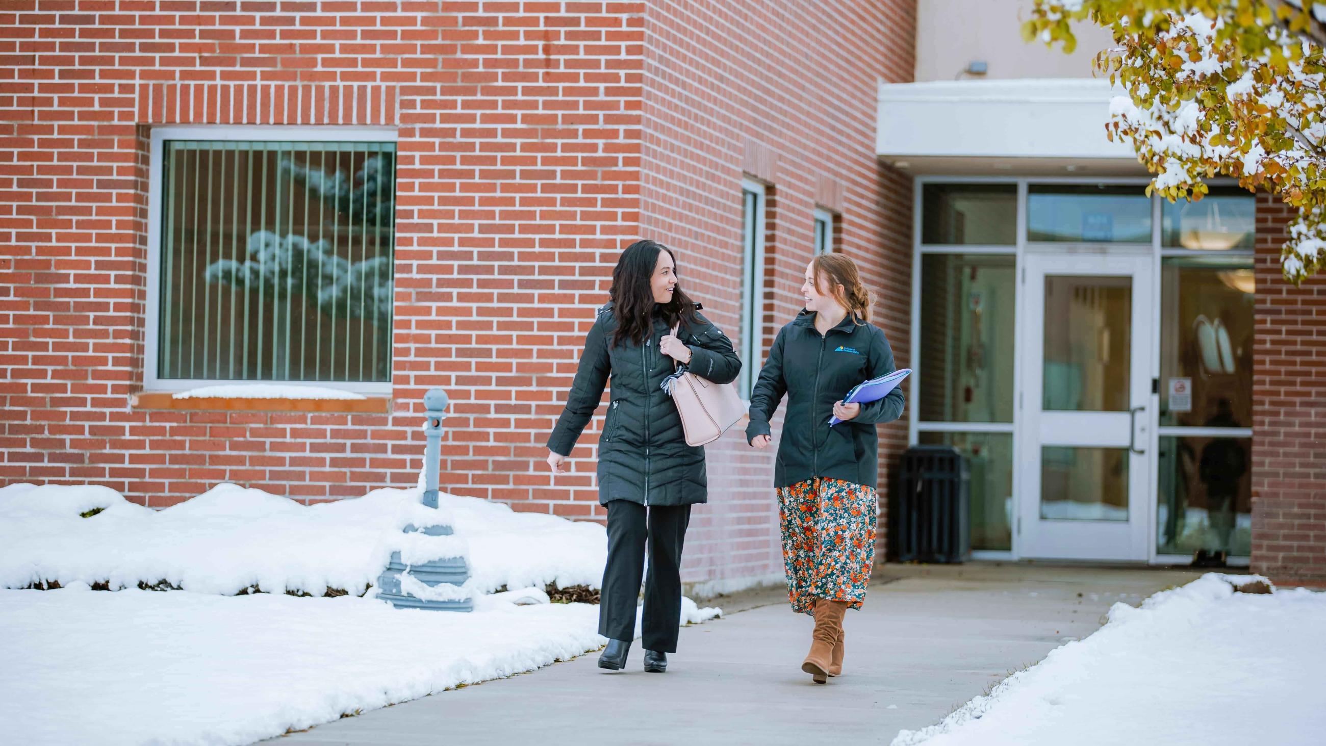 Two women walking